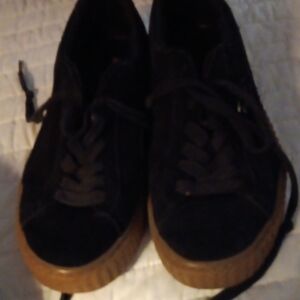 Puma Women's Black Sneakers with Brown Soles Worn